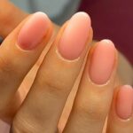 Close-up of sheer pink BIAB manicure