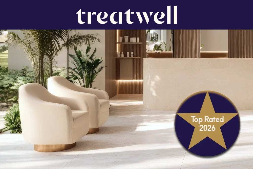Treatwell Top Rated 2026 badge, earned through client reviews, over a bright salon reception with cream armchairs and plants